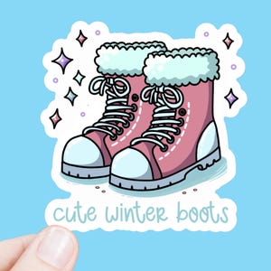 May include: A pair of pink winter boots with white fur trim and white laces. The boots have a white sole and are decorated with sparkly stars. The text "cute winter boots" is written below the boots.