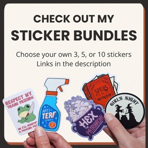 May include: A collection of four stickers featuring a frog with a knife, a blue spray bottle labeled ANTI-TERF SPRAY, a purple cauldron with the text HEX THE PATRIARCHY, and a round sticker with two witches and the text GIRL'S NIGHT.