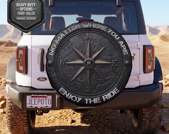 Compass Spare Tire Cover: Enjoy the ride, available in all sizes, heavy-duty vinyl, PVC, and fabric options