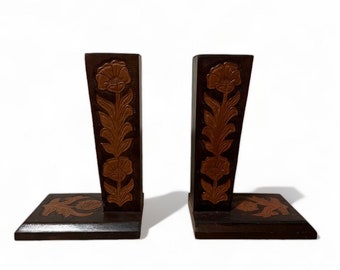 Wood and leather bookends with floral pattern