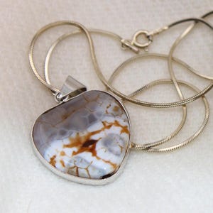Agate heart shaped pendant set in sterling silver on 17&quot; sterling solid round chain