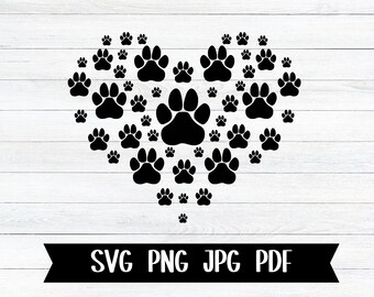Könnte beinhalten: Schwarze Pfotenabdrücke, die in Form eines Herzens auf einem weißen Holzgrund angeordnet sind. Der Text "SVG PNG JPG PDF" befindet sich am unteren Rand des Bildes.