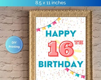 May include: A rectangular gold-toned ornate frame containing a white sign with the text HAPPY 16TH BIRTHDAY in blue and pink. The background features colorful confetti and bunting flags. The digital download measures 8.5 by 11 inches.
