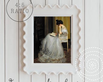 May include: White frame with a scalloped edge, featuring a painting of a woman in a white dress reading a book. The frame is on a white wood background. 4:5 Ratio.