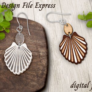 May include: A pair of earrings featuring a seashell design. One earring is made of white acrylic and the other is made of wood with a brown and white finish. Both earrings have a silver hook.