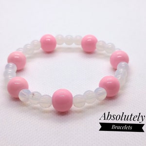 Roze en witte opalietkralen stretcharmband - 7 inch