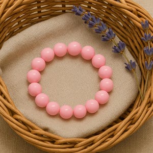 Lichtroze stretcharmband met kralen: 10 mm pastelkleurige sieraden