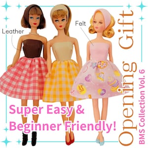 May include: Three fashion dolls wearing strapless dresses and headbands. The left doll has a brown leather bodice and pink gingham skirt. The center doll has a beige bodice and yellow gingham skirt. The right doll has a pink felt bodice and candy-print skirt.