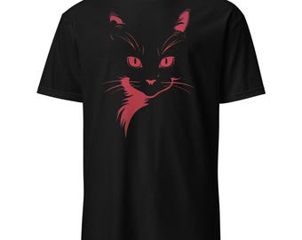 May include: Black t-shirt featuring a stylized red cat face graphic. The cat's eyes, ears, and facial details are rendered in a bold, contrasting red, creating a striking visual effect. The design is centered on the shirt.