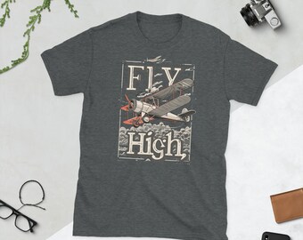 May include: A dark heather grey t-shirt with a vintage-style graphic of a red and white airplane flying through clouds. The graphic includes the text "FLY High".