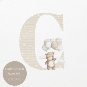 May include: A cross-stitch pattern PDF showing a beige letter "G" with white hearts. A teddy bear holds balloons and floats on clouds. The text "CROSS STITCH Pattern PDF" and "Juliette Embroidery" are in a circle.