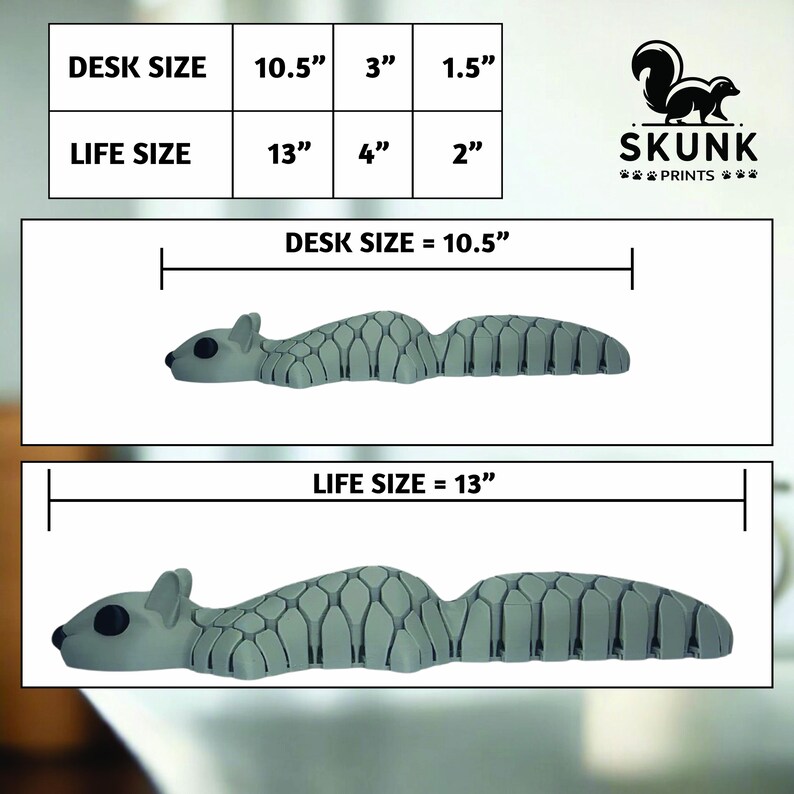 May include: A gray squirrel-shaped desk organizer. The image shows two sizes: desk size at 10.5 inches long and life size at 13 inches long. The organizer has a textured design and is labeled with the text "SKUNK PRINTS."