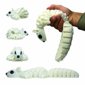 May include: A white, articulated squirrel toy with black eyes and a segmented body. The toy is shown in various poses, including curled up, stretched out, and held in a hand. The design features a detailed, textured surface.