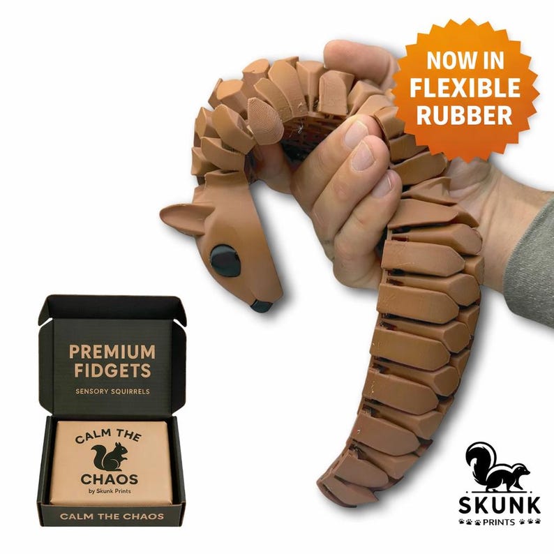 Brown flexible 3D printed squirrel fidget toy for sensory seekers, ADHD, and autism, shown bending in a hand with premium gift box packaging by Skunk Prints Sesorysquirrels.com