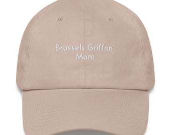 May include: A beige baseball cap with the text "Brussels Griffon Mom" embroidered in white on the front.