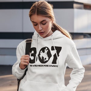 Wyoming 307 The World Needs More Cowboys Black Hoodie