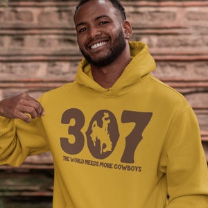 Wyoming 307 The World Needs More Cowboys Hoodie