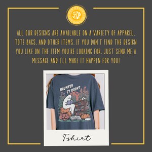 May include: Dark blue t-shirt with a graphic featuring a ghost reading a book, pumpkins, and the text "HAUNTED BY BOOKS." The shirt is part of a collection available on apparel, tote bags, and other items.