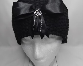 Infinity Heart & Bow Waffle Knitted Headband Embellished with Stainless steel Infinity Heart pendant and stainless steel chain.