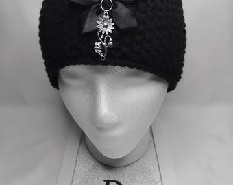 Dark Bloom Waffle Knitted Headband Embellished with Stainless steel Flower pendant and handmade satin Flower Ribbon.
