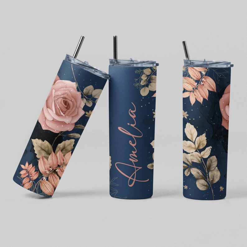 Tumblers with custom name Amelia displayed on textured background, floral elegance series.