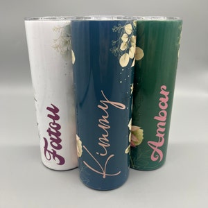 Custom tumblers with floral patterns, names Fatou, Kimmy, Ambar in script, bridesmaid gift idea.