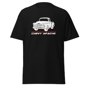 May include: Black t-shirt with a white silhouette of a vintage Chevy Apache pickup truck and the text "CHEVY APACHE" in white.
