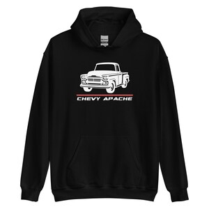 May include: Black hooded sweatshirt with a white graphic of a vintage Chevy Apache pickup truck. The text "CHEVY APACHE" is below the truck in white letters with a red line. The sweatshirt has a front pocket and a hood.