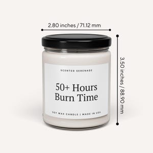 a candle labeled "Scented Serenade" with a black lid, and it is described as having a 50+ Hours Burn Time. The candle is shown in a jar, and the image is set against a white background.