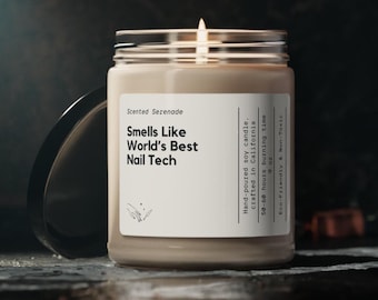 May include: A beige soy candle in a glass jar with a black lid. The white label reads: Scented Serenade, Smells Like World's Best Nail Tech, Hand-poured soy candle, crafted in California, 50-60 hours burning time, 9 oz, Eco-Friendly & Non-Toxic.