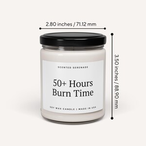 a candle labeled "Scented Serenade" with a black lid, and it is described as having a 50+ Hours Burn Time. The candle is shown in a jar, and the image is set against a white background.