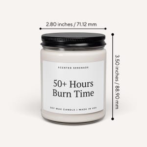 a white candle labeled "Scented Serenade" with a black cap. The candle is described as having a 50+ Hours Burn Time and is made in the USA. The candle is approximately 2.80 inches tall, with a 712 mm height.
