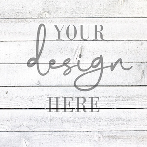 May include: Whitewashed wood background with the text "YOUR design HERE" in gray lettering.