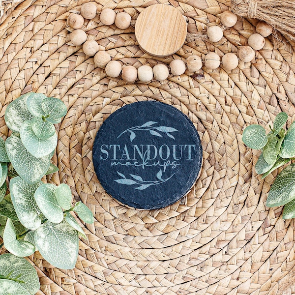 Round black slate coaster mockup. Blank drink coaster stock photo. Add your design