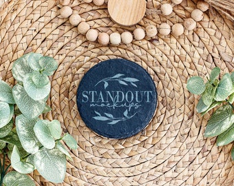 Round black slate coaster mockup. Blank drink coaster stock photo. Add your design