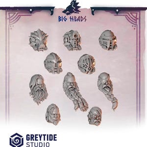 May include: A collection of grey miniature heads and beards. The heads feature various helmet designs, while the beards are intricately sculpted with detailed textures. The text "BIG HEADS" and "GREYTIDE STUDIO" are visible.
