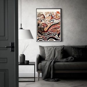 May include: Abstract art print with a swirling pattern of brown, red, and white. The print is framed in a black frame and is hanging on a gray wall.