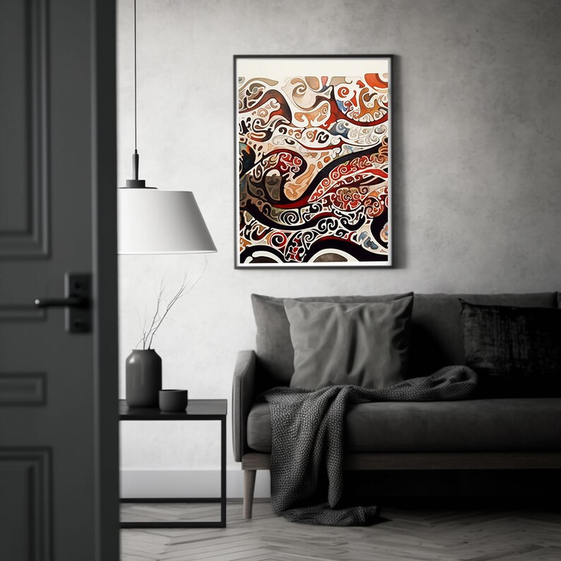 May include: Abstract art print with a swirling pattern of brown, red, and white. The print is framed in a black frame and is hanging on a gray wall.
