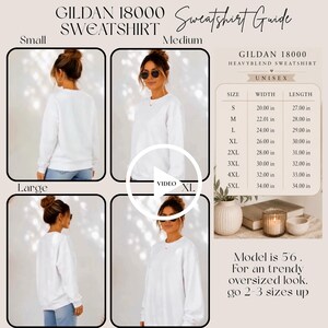May include: A Gildan 18000 white crewneck sweatshirt shown in four different sizes on a model. The image includes a size chart with width and length measurements in inches, ranging from small to 5XL, and text stating the model is 5'6 tall.