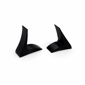 May include: Two black, angular display stands. Each stand has a curved base and a tall, triangular upright section. The stands are made of a solid, matte material and are set against a white background.