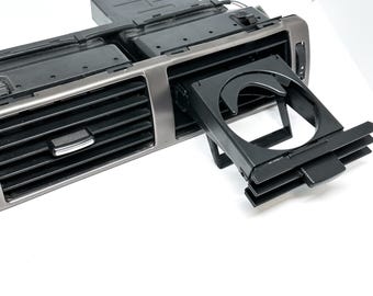 Audi A6 C5 sliding cup holder center right vent