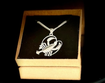 Halsband i sterlingsilver med hänge av stjärntecken: Födelsedagspresent