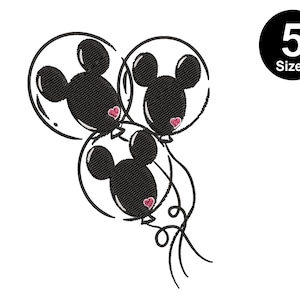 May include: Three black Mickey Mouse head balloons with pink hearts tied together with a string.