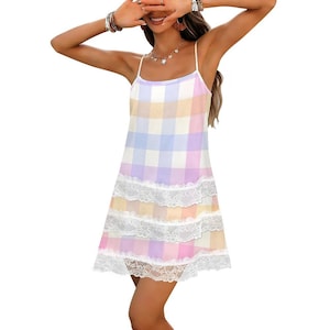 May include: A pastel plaid slip dress with spaghetti straps and a tiered lace hem. The dress features a colour palette of soft pink, yellow, blue, and lavender. The dress is a knee-length design.