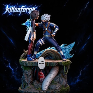 May include: A detailed resin statue featuring two anime characters in a combat pose on a rocky base. One character has silver hair and a blue mask, while the other has dark hair. A speech bubble with the text ...KA-KASHI... is visible on the base.