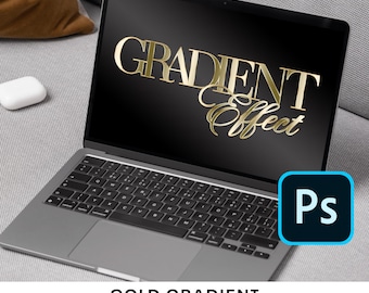 May include: A laptop computer displaying a gold gradient text effect that reads "GRADIENT Effect" on a black background. The laptop has a silver case and a black keyboard. A blue and white Photoshop icon is in the lower right corner of the image.