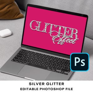 May include: A laptop computer screen displaying a silver glitter text effect that says "Glitter Effect" on a pink background. The Photoshop logo is visible in the lower right corner of the screen.