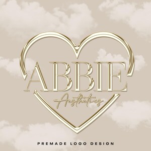 Skönhetslogotypdesign, färdig logotyp, beige hjärta, salongslogotyp, bubbeleffekt, guldlogotyp, flickigt, år 2000, valfritt namn, guldkrämmolntema