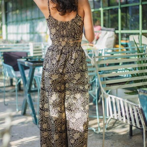 boho hippie festival outfit of matching black crop top andwide leg long pants with pockets for women- Odhanon