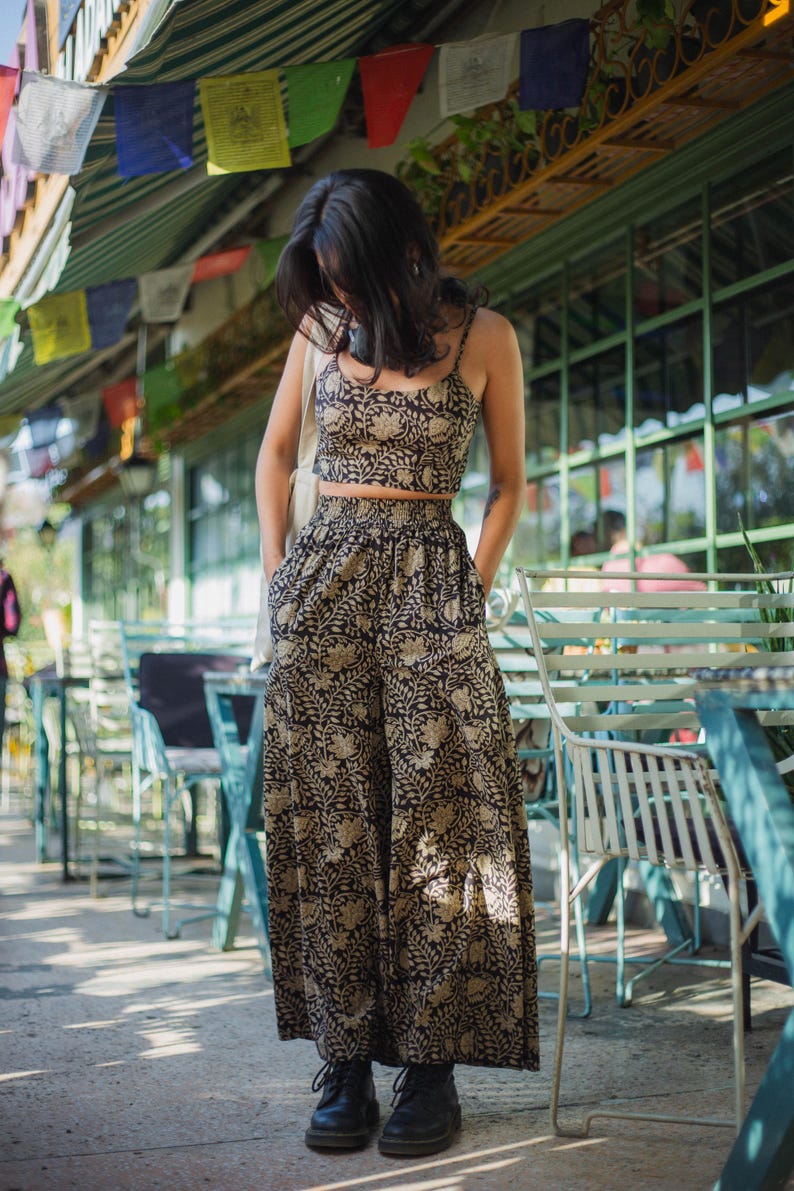 a boho matching set of cotton black floral crop top and matching block printed flare pants for women summer vacation- Odhanon
